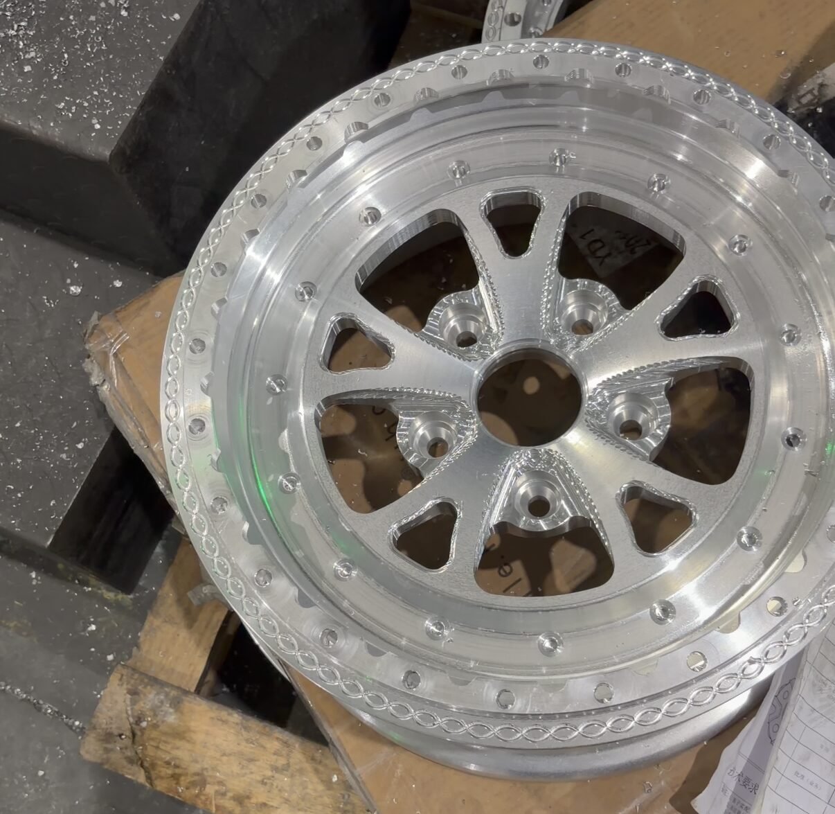Close-up of a precision CNC-machined forged beadlock wheel