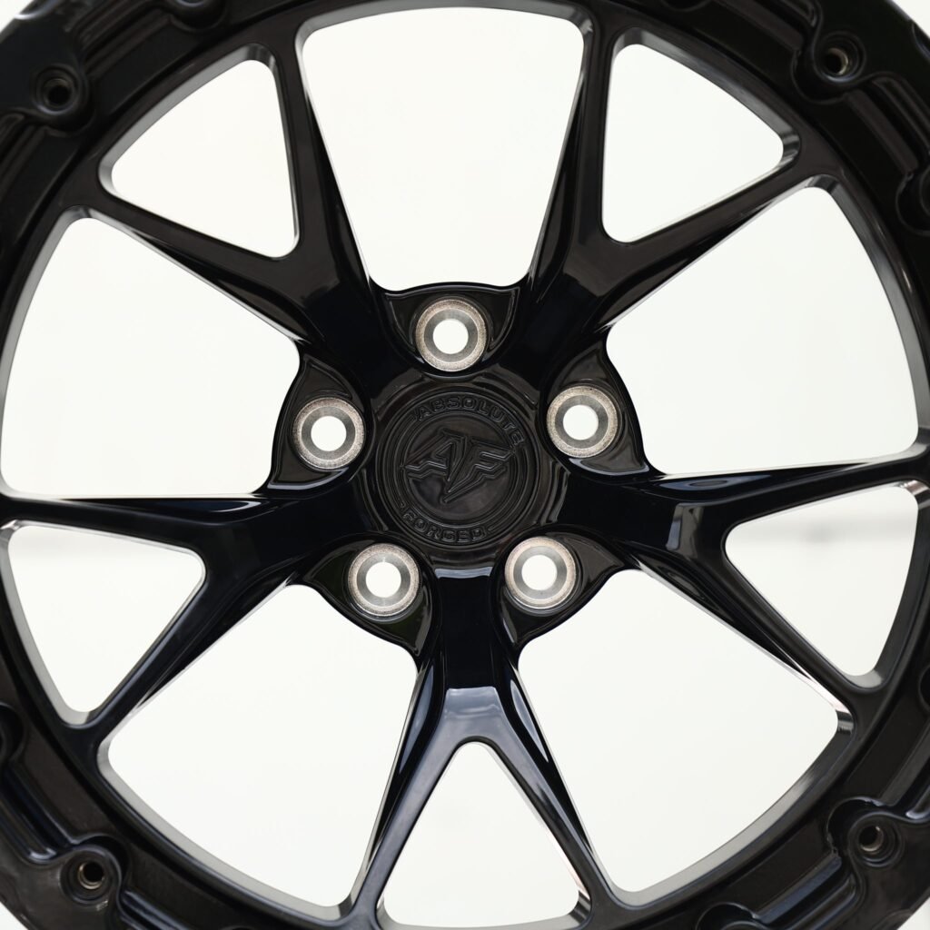 5x114.3 wheels – Gloss Black 10-Spoke Beadlock (Absolute Forged-Style), side view
