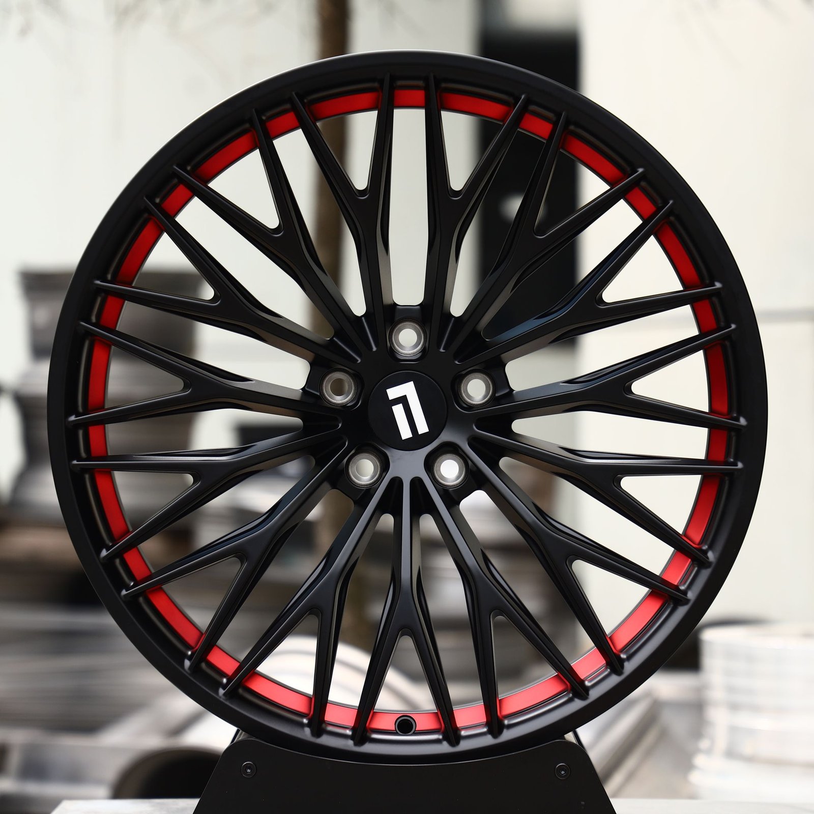 Audi A4 wheels – Matte Black / Red Lip Multi-Spoke, front view