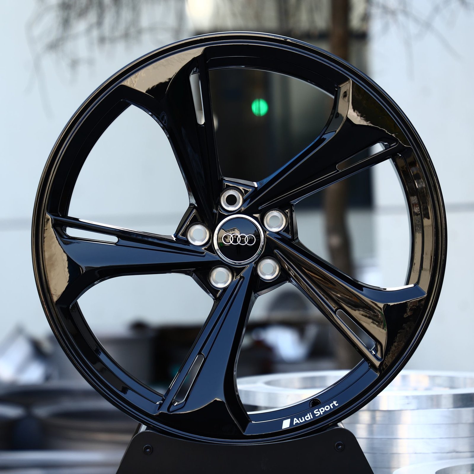 Audi A4 wheels – Gloss Black Directional 5-Spoke (Audi OEM-Style), front view