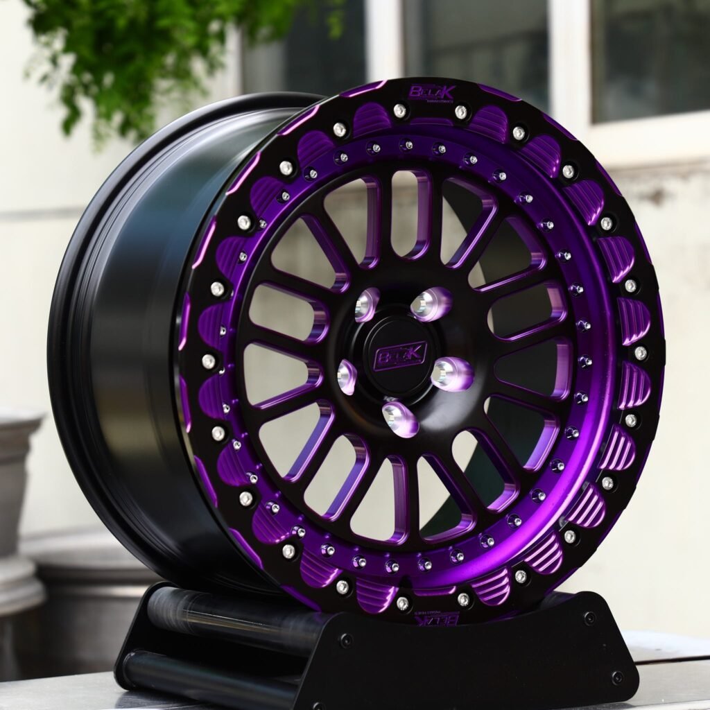 Chevrolet Corvette C7 wheels – Gloss Black / Purple Mesh Beadlock (Belak-Style), angled view