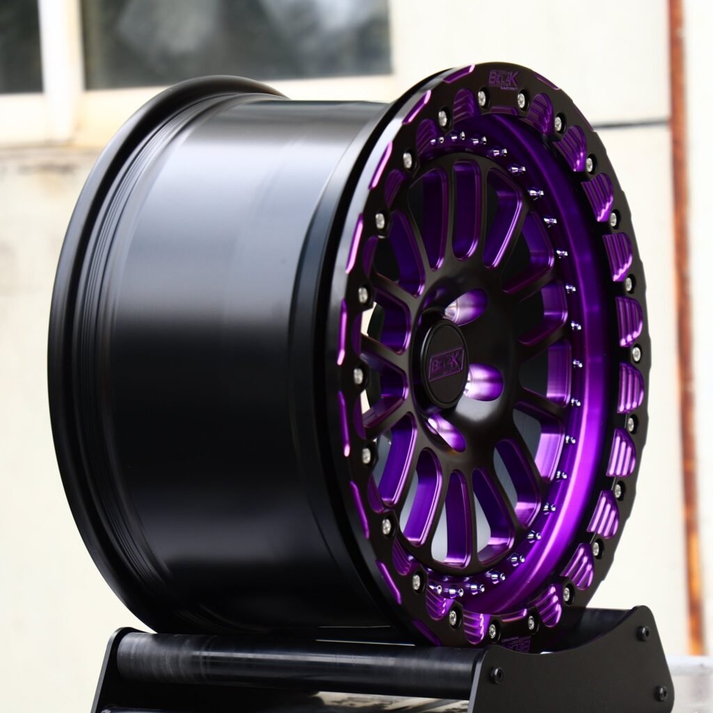 5x114.3 wheels – Gloss Black / Purple Mesh Beadlock (Belak-Style), side view