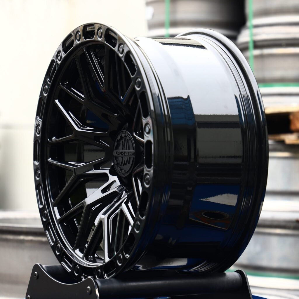 Toyota Tacoma wheels – Black Bear Gloss Black 10 Y-Spoke Exposed Bolt Detail, angled view