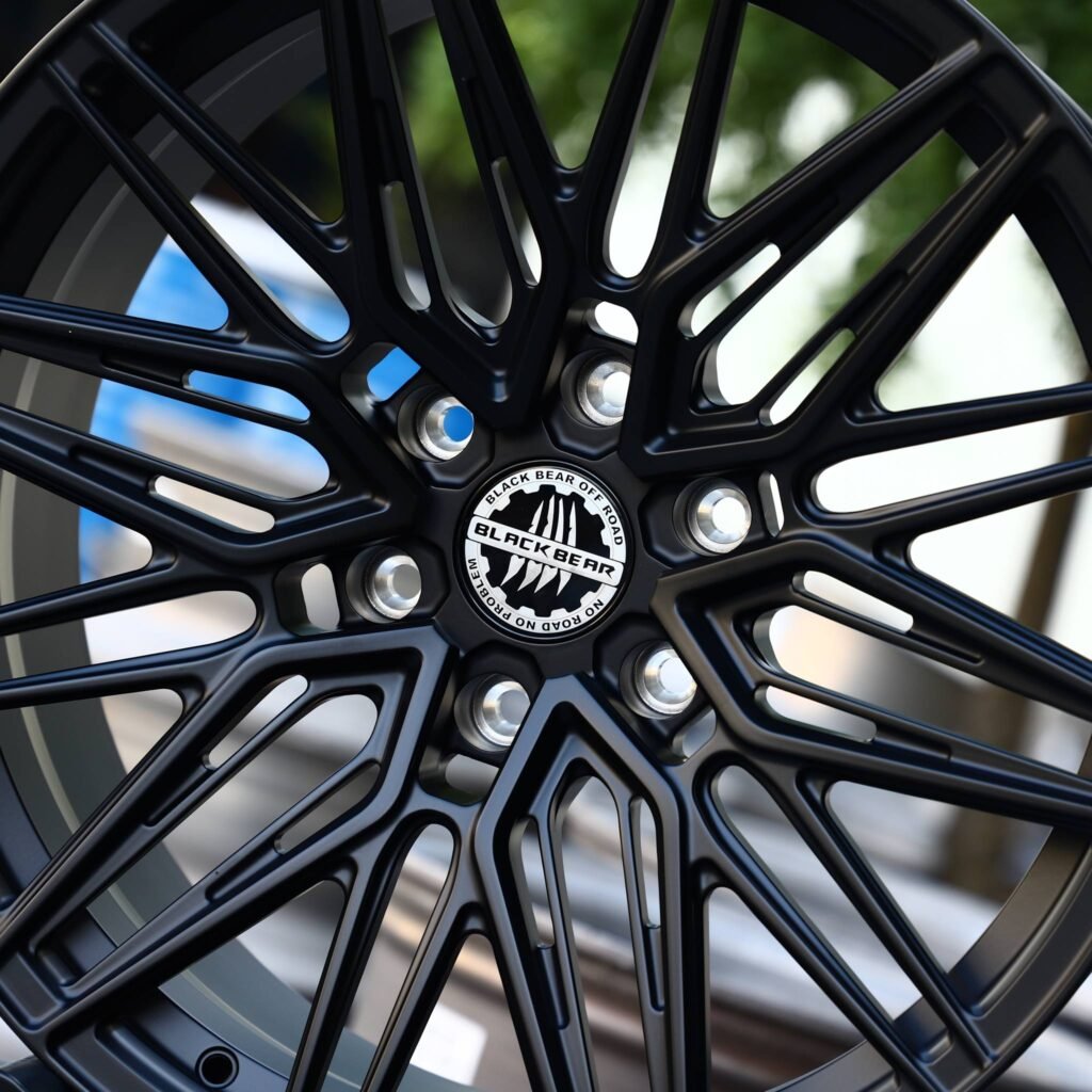 Chevrolet Silverado 1500 wheels – Black Bear Gloss Black 10 Y-Spoke Side-Milled, lip and barrel detail