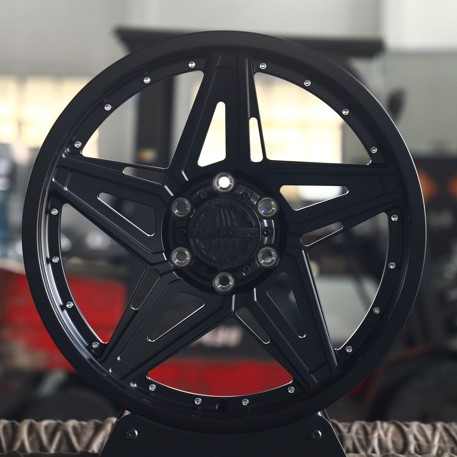 Toyota 4Runner wheels – Black Bear Gloss Black 5-Star Spoke Riveted, front view