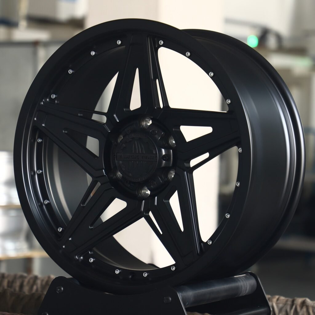 Toyota Tacoma wheels – Black Bear Gloss Black 5-Star Spoke Riveted, angled view