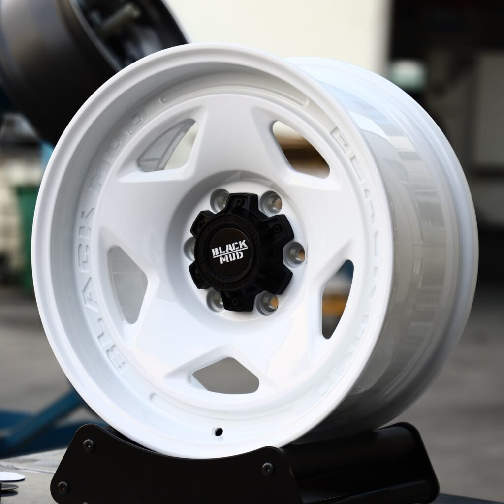 Toyota Tacoma wheels – Black Mud Custom Finish 5-Star Spoke Deep Lip, angled view