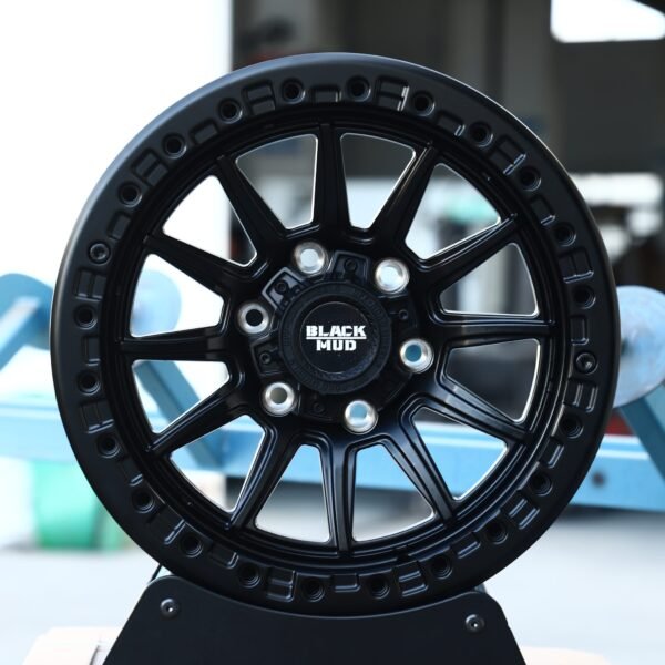 Toyota 4Runner wheels – Black Mud Gloss Black 12-Spoke, front view