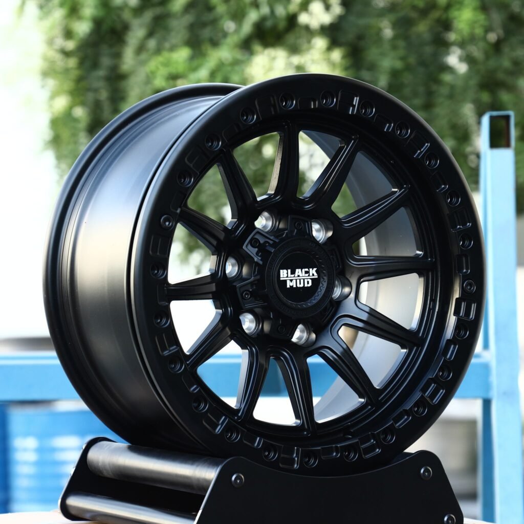 Toyota Tacoma wheels – Black Mud Gloss Black 12-Spoke, angled view