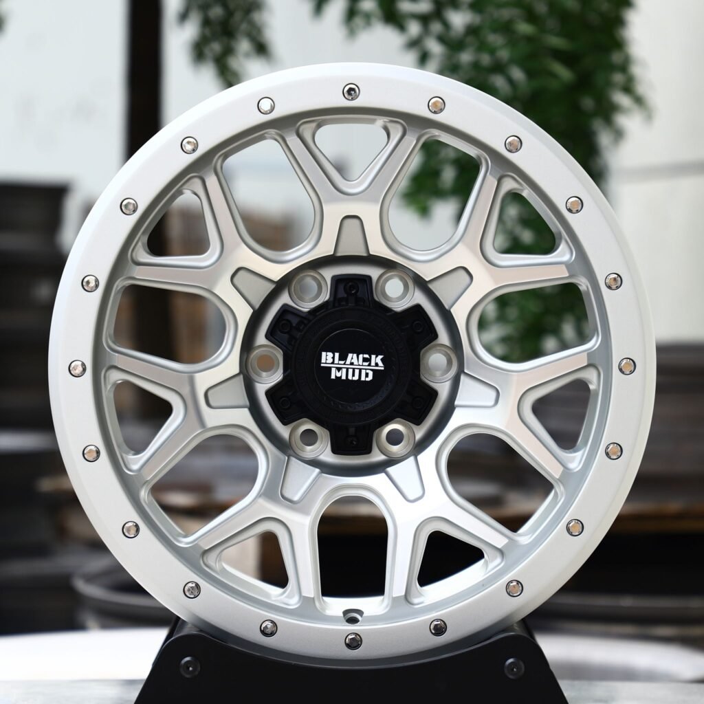 Toyota 4Runner wheels – Black Mud Silver Exposed Bolt Detail, front view