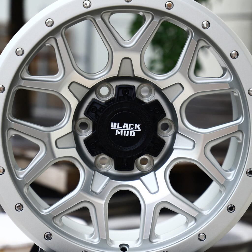 6x139.7 wheels – Black Mud Silver Exposed Bolt Detail, side view
