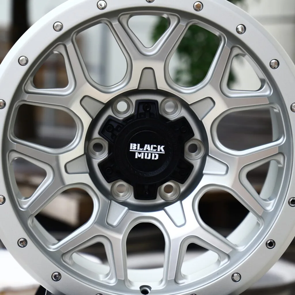 6x139.7 wheels – Black Mud Silver Exposed Bolt Detail, side view