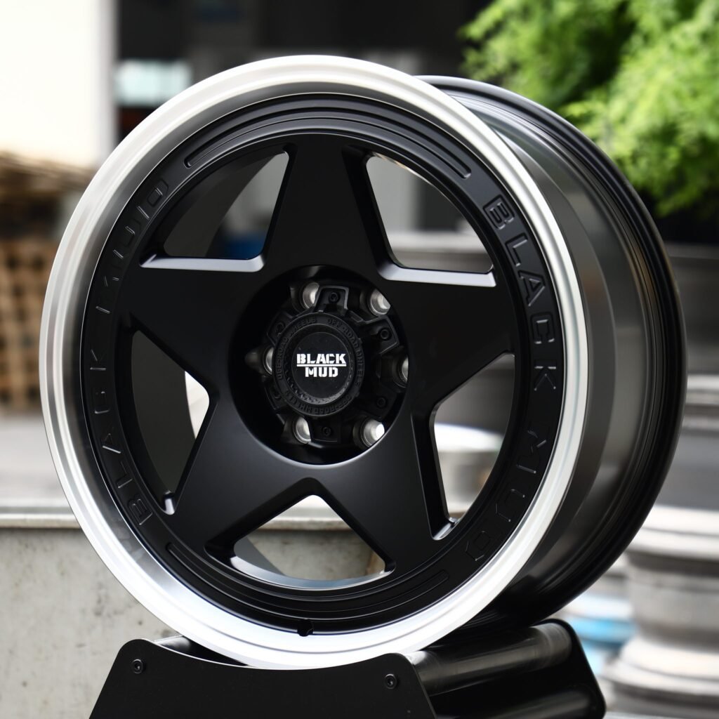 Toyota Tacoma wheels – Matte Black 5-Star Polished Lip (Black Mud-Style), angled view