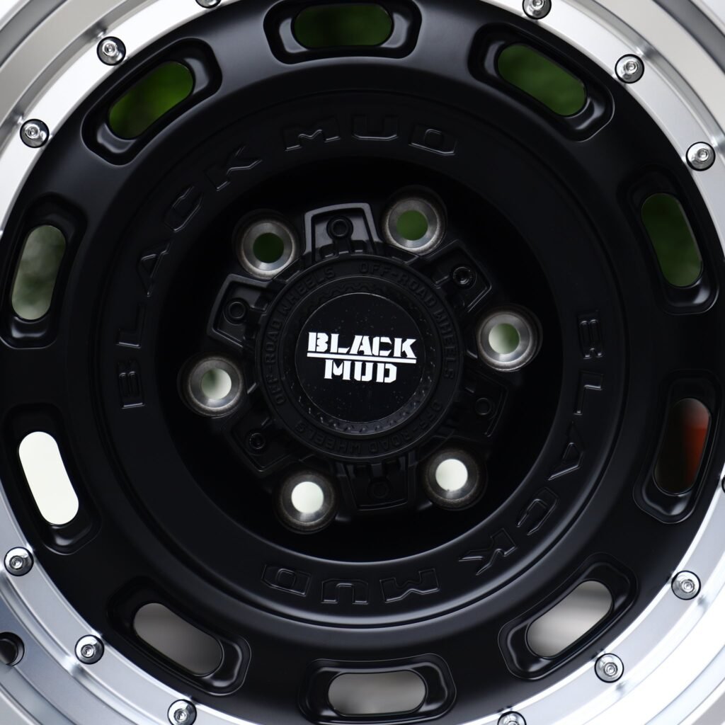 Chevrolet Silverado 1500 wheels – Matte Black Slotted Dish Polished Riveted Lip (Black Mud-Style), lip and barrel detail