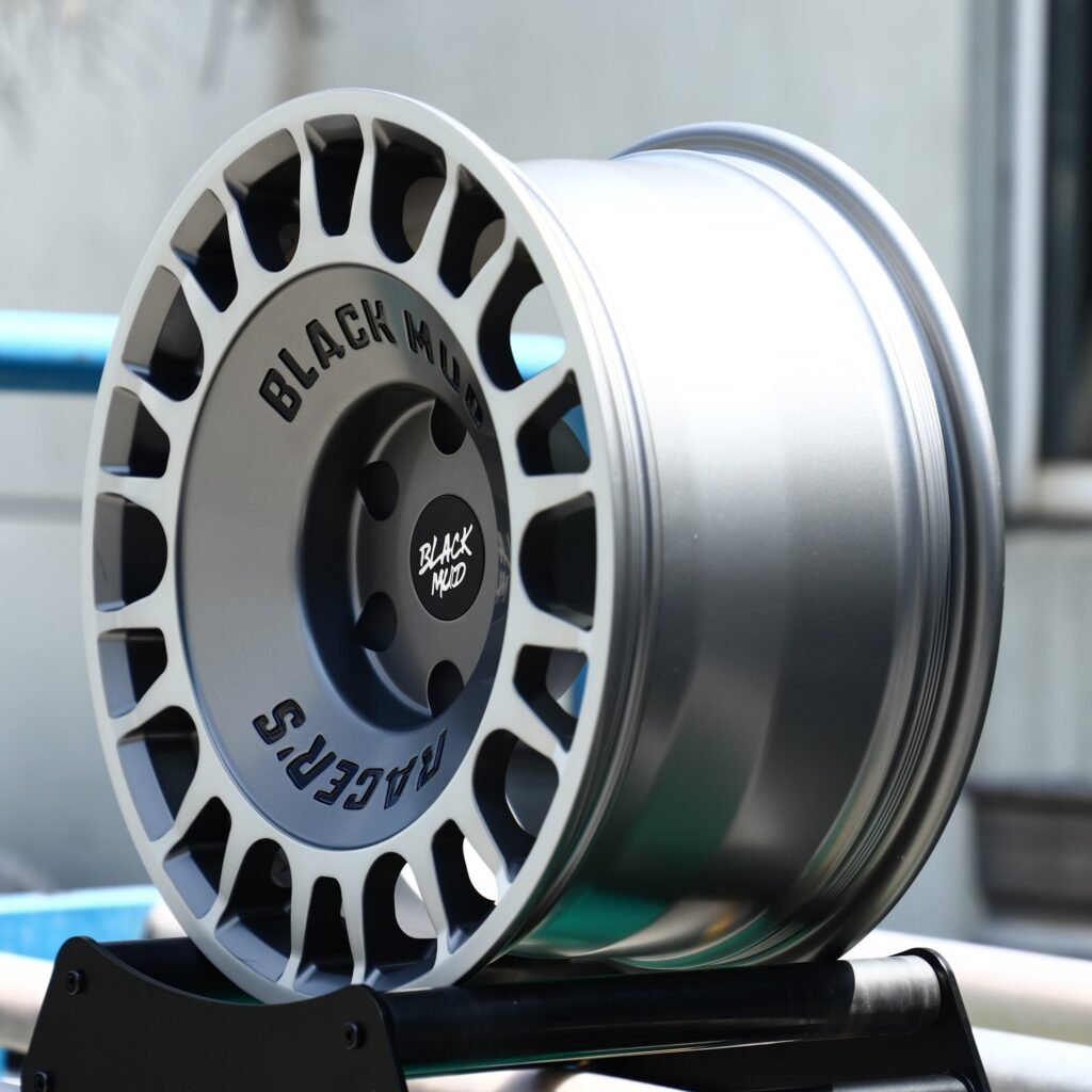 6x139.7 wheels – Silver / Gunmetal Slotted Rally Dish (Black Mud-Style), side view