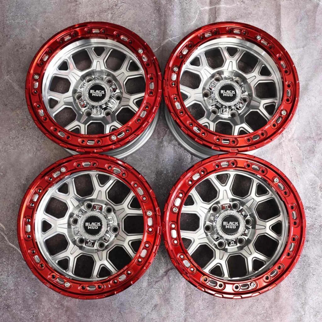 Toyota Tacoma wheels – Black Mud Transparent Red Custom Beadlock, angled view