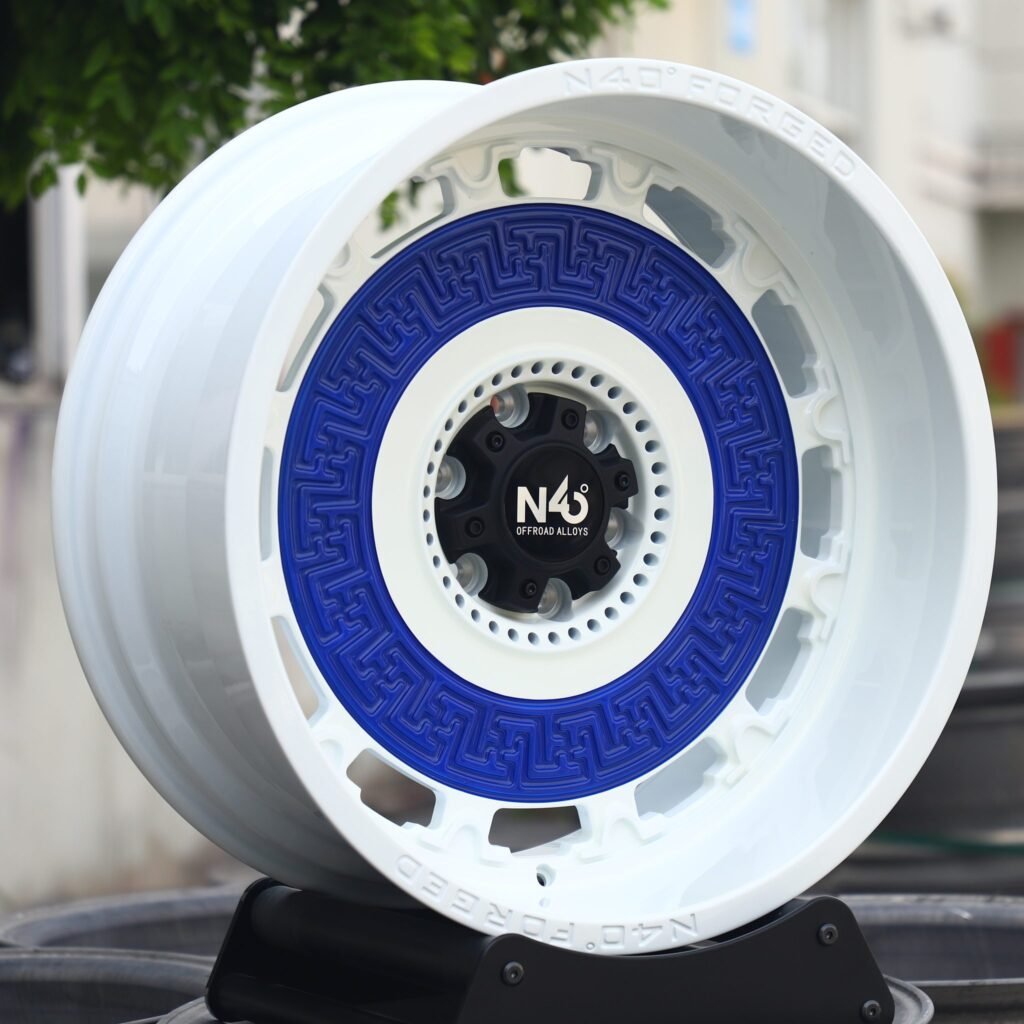 Toyota Tacoma wheels – Blue / Gloss White Custom, angled view