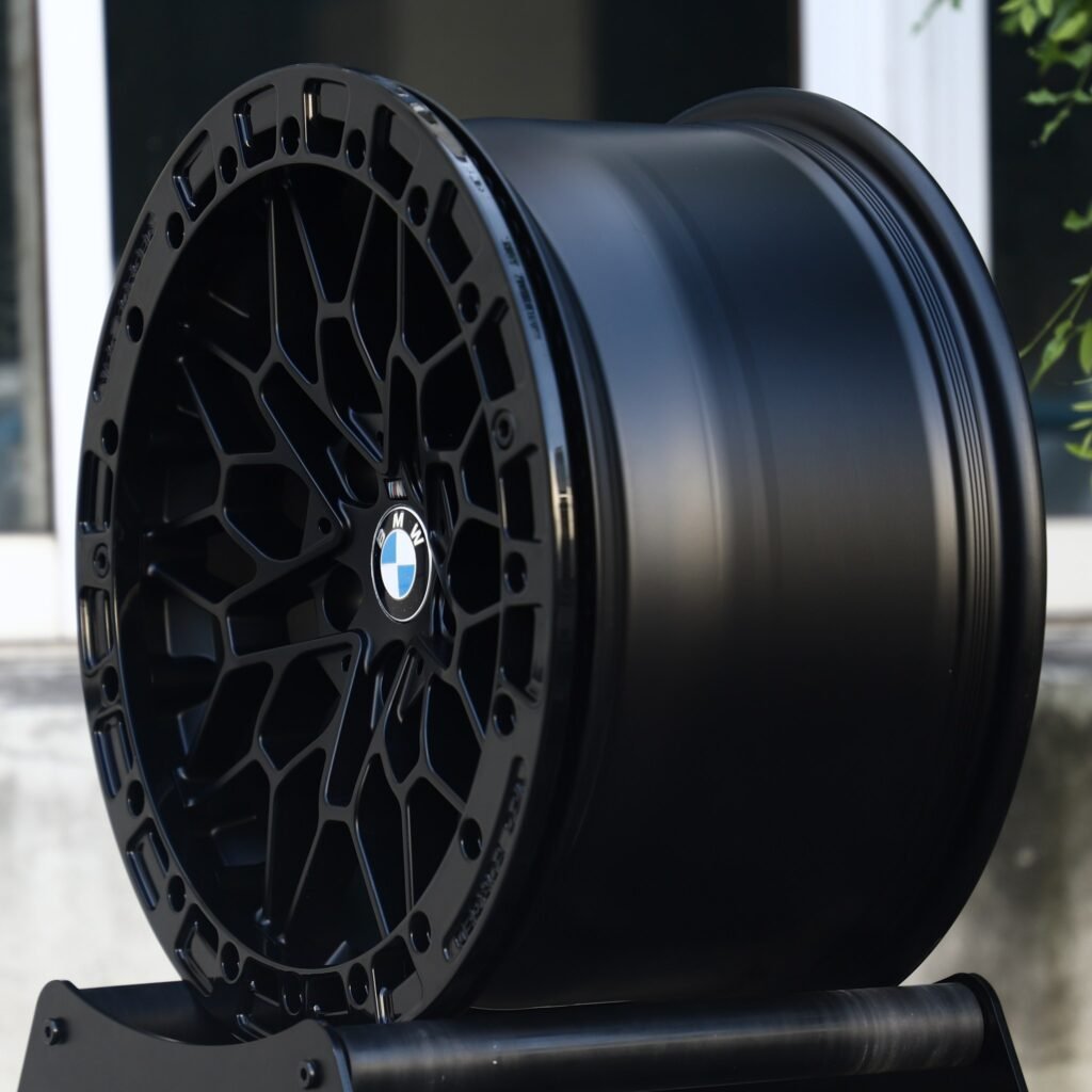 BMW M5 wheels – Matte Black Mesh Beadlock (BMW OEM-Style), angled view