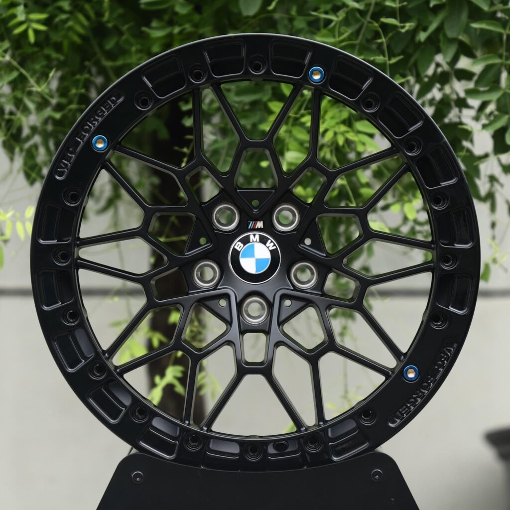 BMW M3 wheels – Matte Black Mesh Blue-Bolt Beadlock (BMW OEM-Style), front view