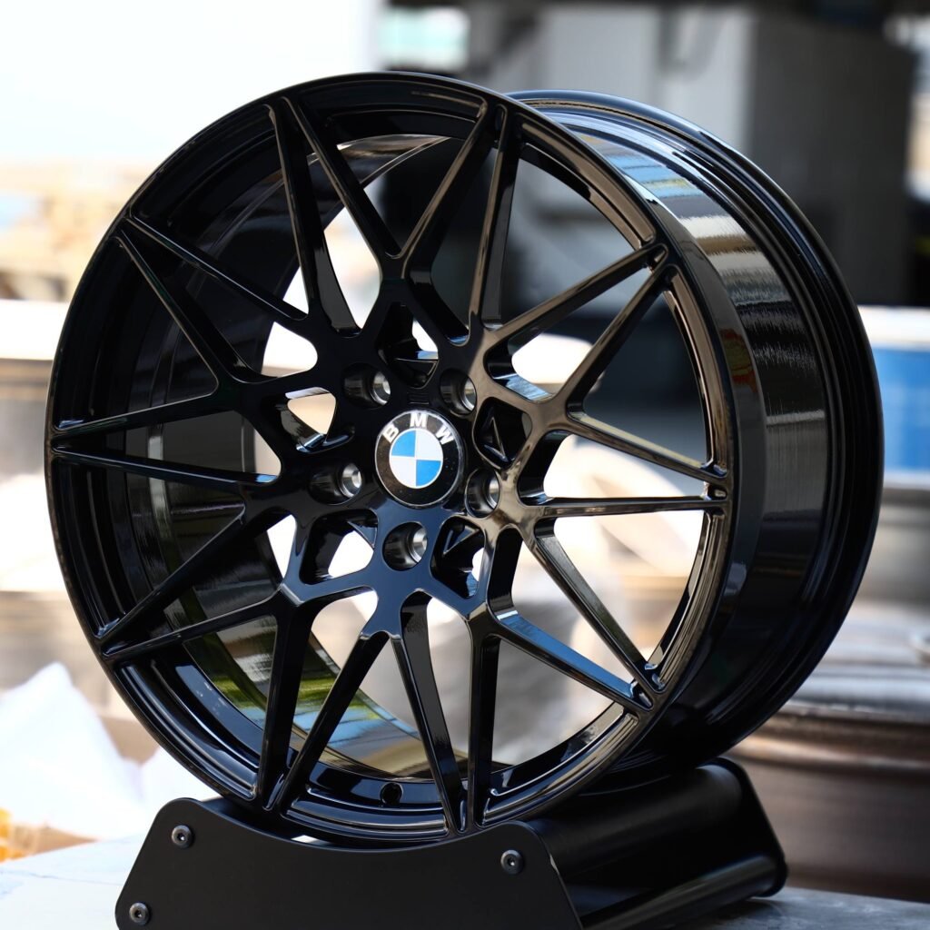BMW 3 Series wheels – Gloss Black Cross-Spoke (BMW Style 666M), angled view