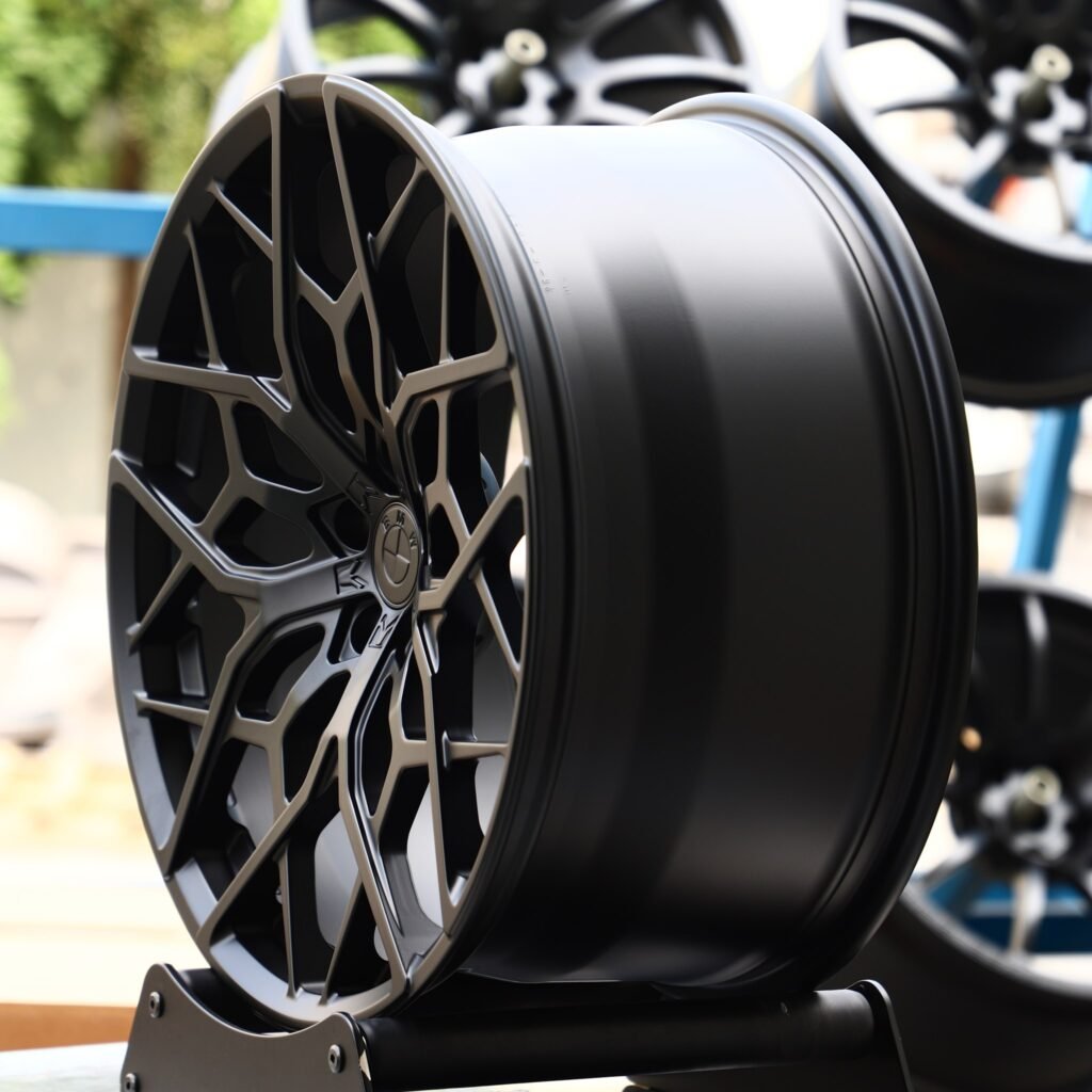 5x120 wheels – Gloss Black Cross-Spoke, side view