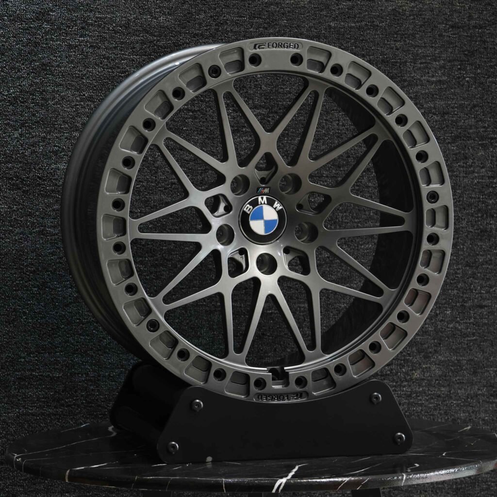 BMW M4 F82 wheels – Gloss Black / Gunmetal Custom Beadlock (BMW OEM-Style), angled view