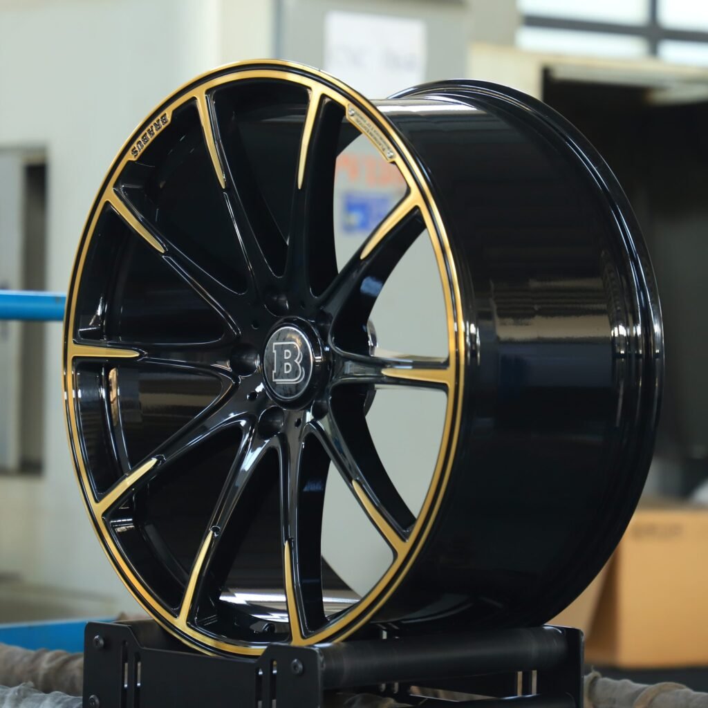 5x130 wheels – Brabus Gloss Black / Gold 10-Spoke Machined Lip, side view