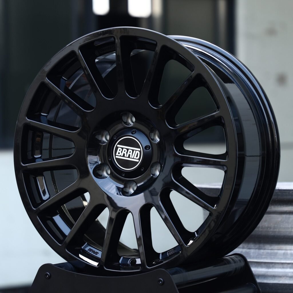 Chevrolet Silverado wheels – Gloss Black 15-Spoke (Braid-Style), angled view