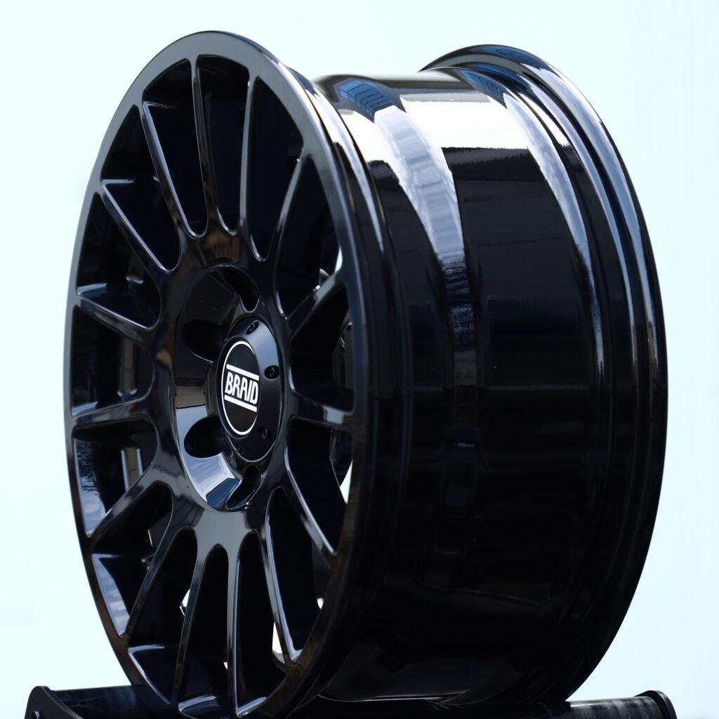 6x135 wheels – Gloss Black 15-Spoke (Braid-Style), side view