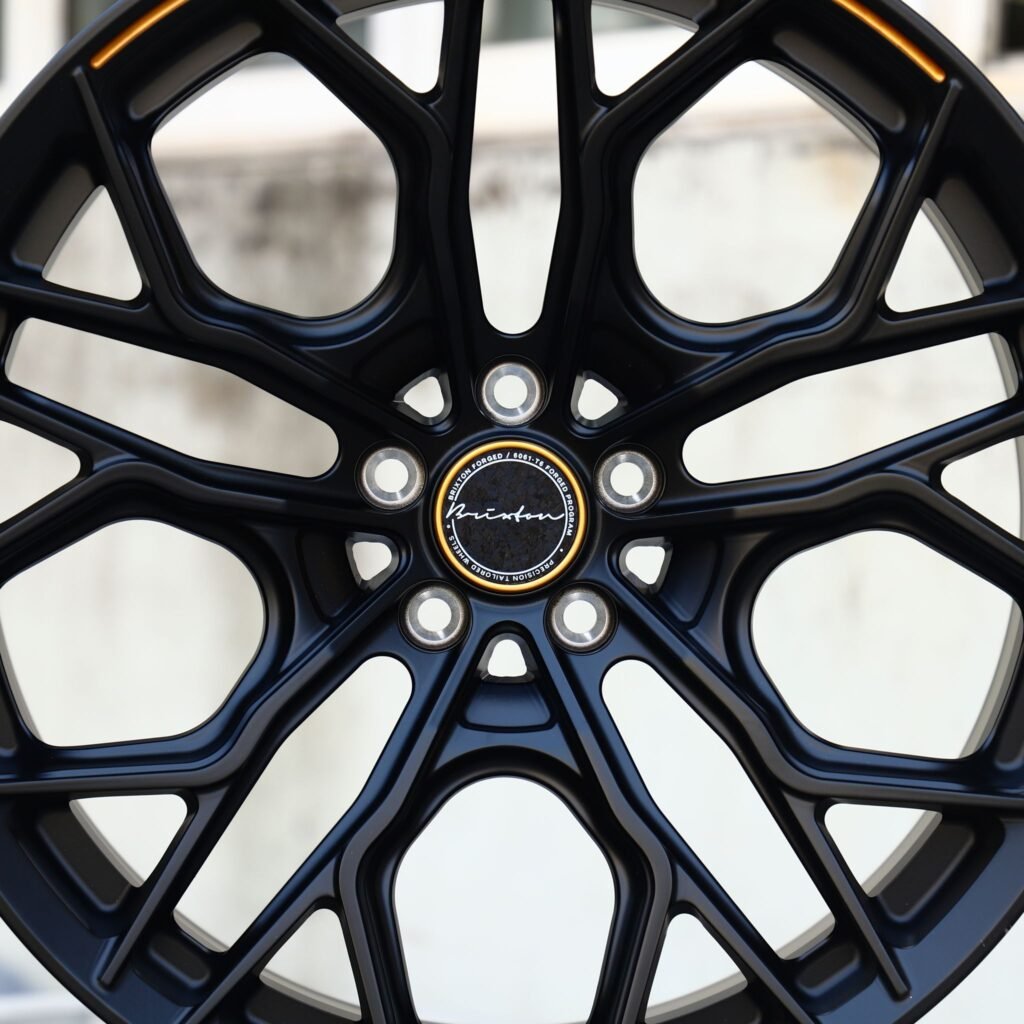 BMW M3 wheels – Matte Black 10 Y-Spoke Gold Pinstripe (Brixton-Style), angled view