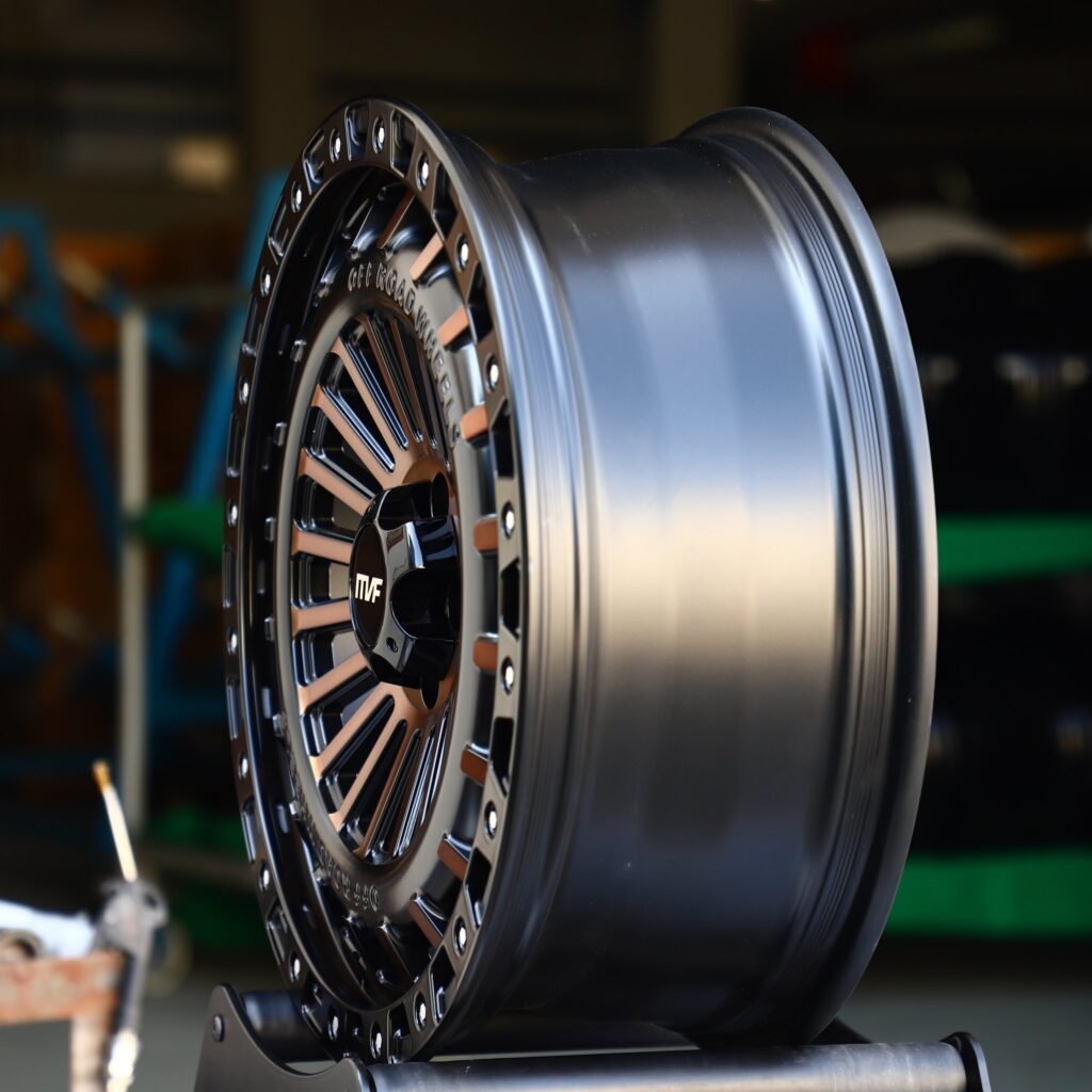 Toyota Tacoma wheels – Bronze / Gloss Black Exposed Bolt Detail Double Ring Lip, angled view