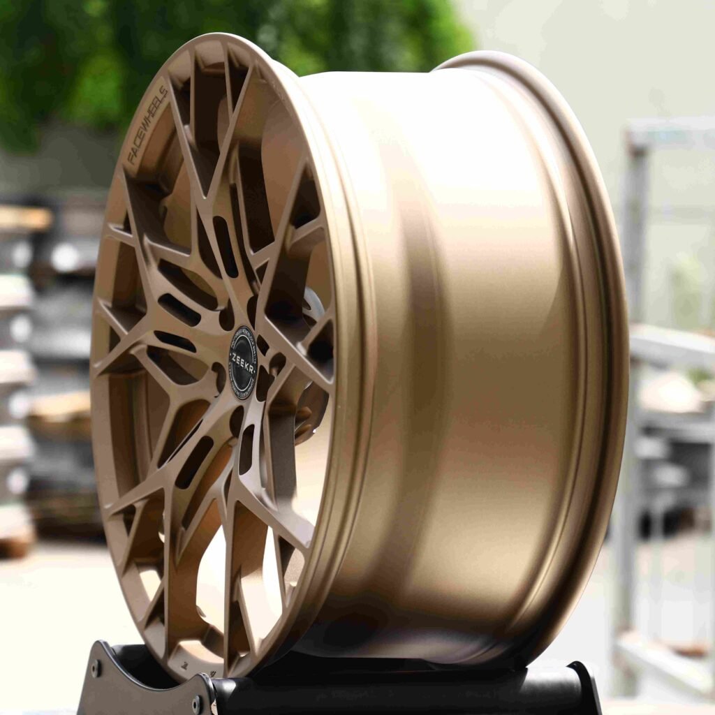 Zeekr 009 wheels – Bronze Gold Cross-Spoke (Zeekr OEM-Style), angled view