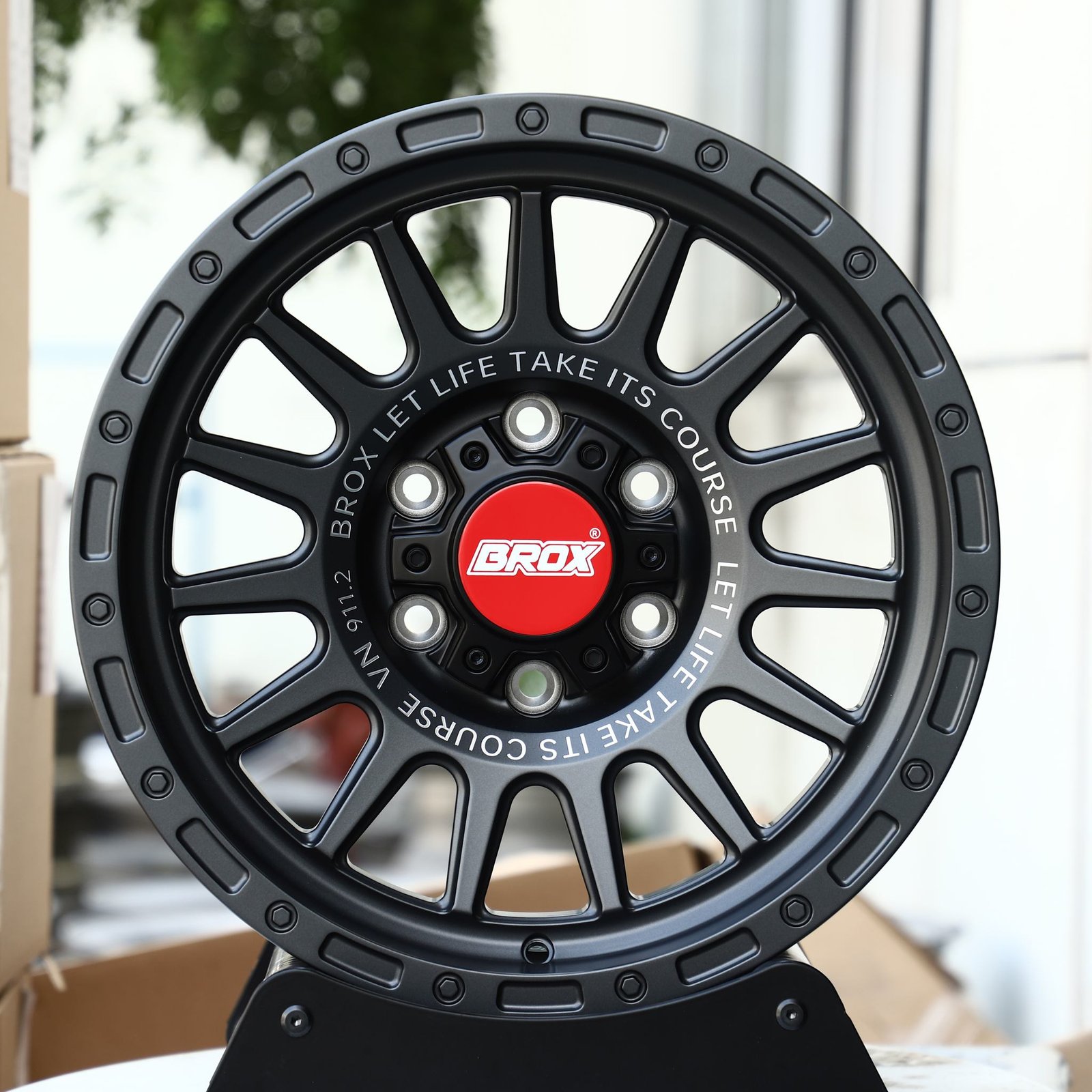 Toyota 4Runner wheels – BROX Gloss Black / Gunmetal / Gray 15-Spoke Exposed Bolt Detail, front view