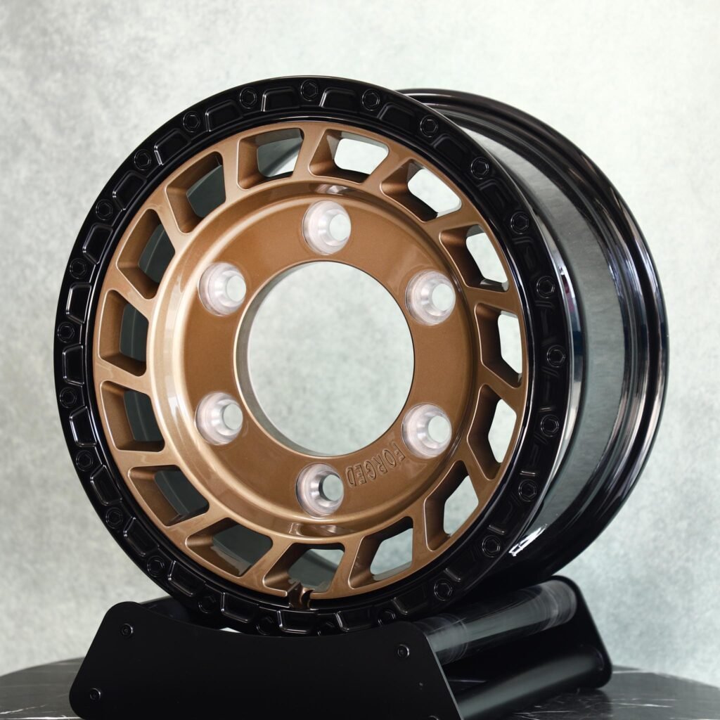 6x139.7 wheels – Bronze / Black Slotted Deep Lip, side view