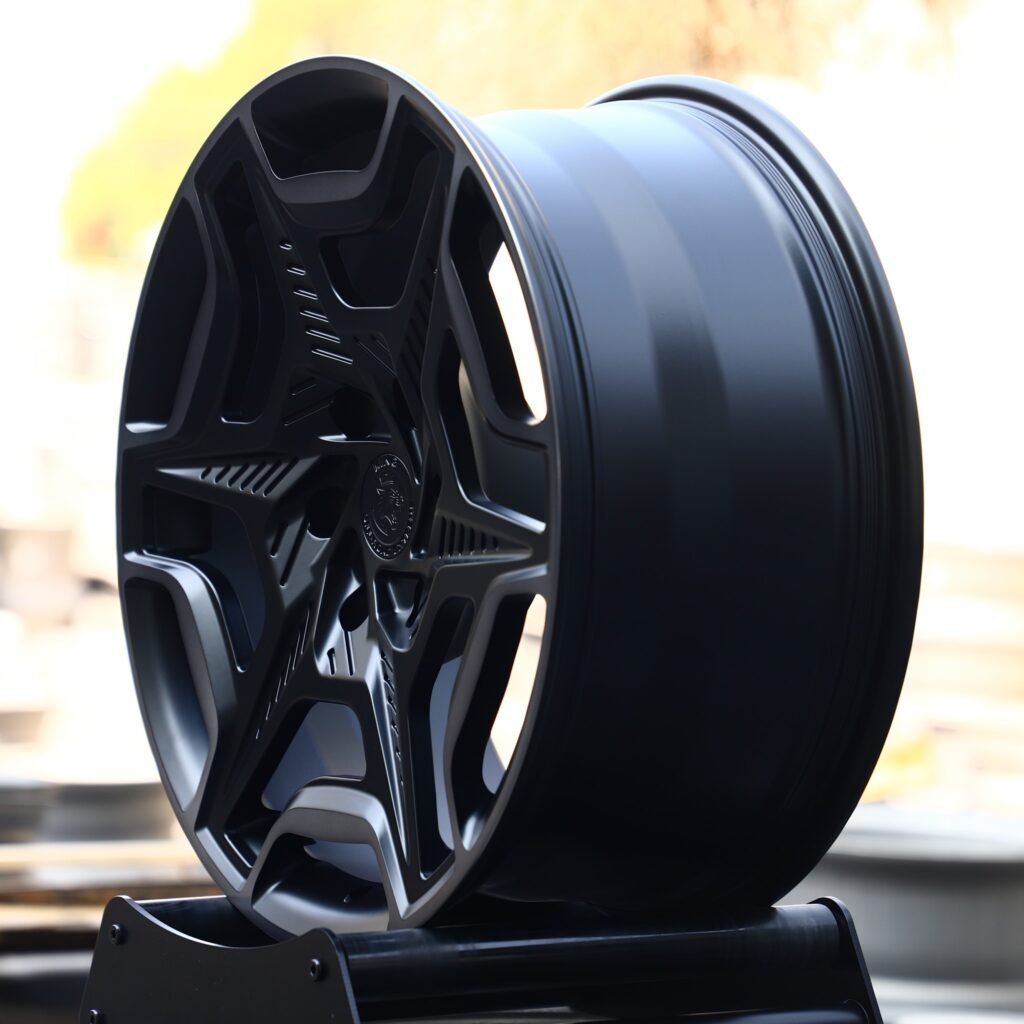 6x139.7 wheels – Matte Black 6-Spoke Star, side view