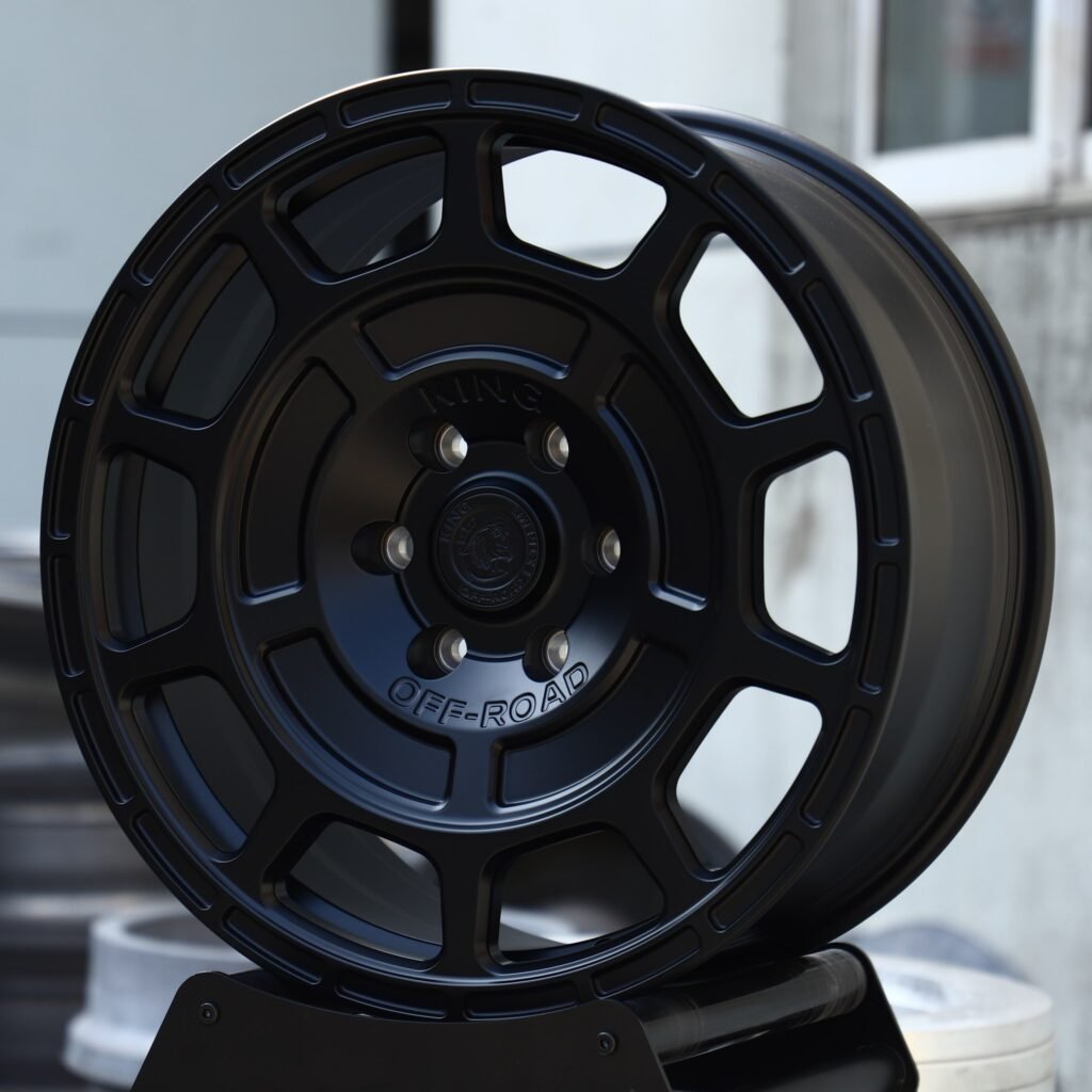 6x139.7 wheels – Matte Black Slotted, side view