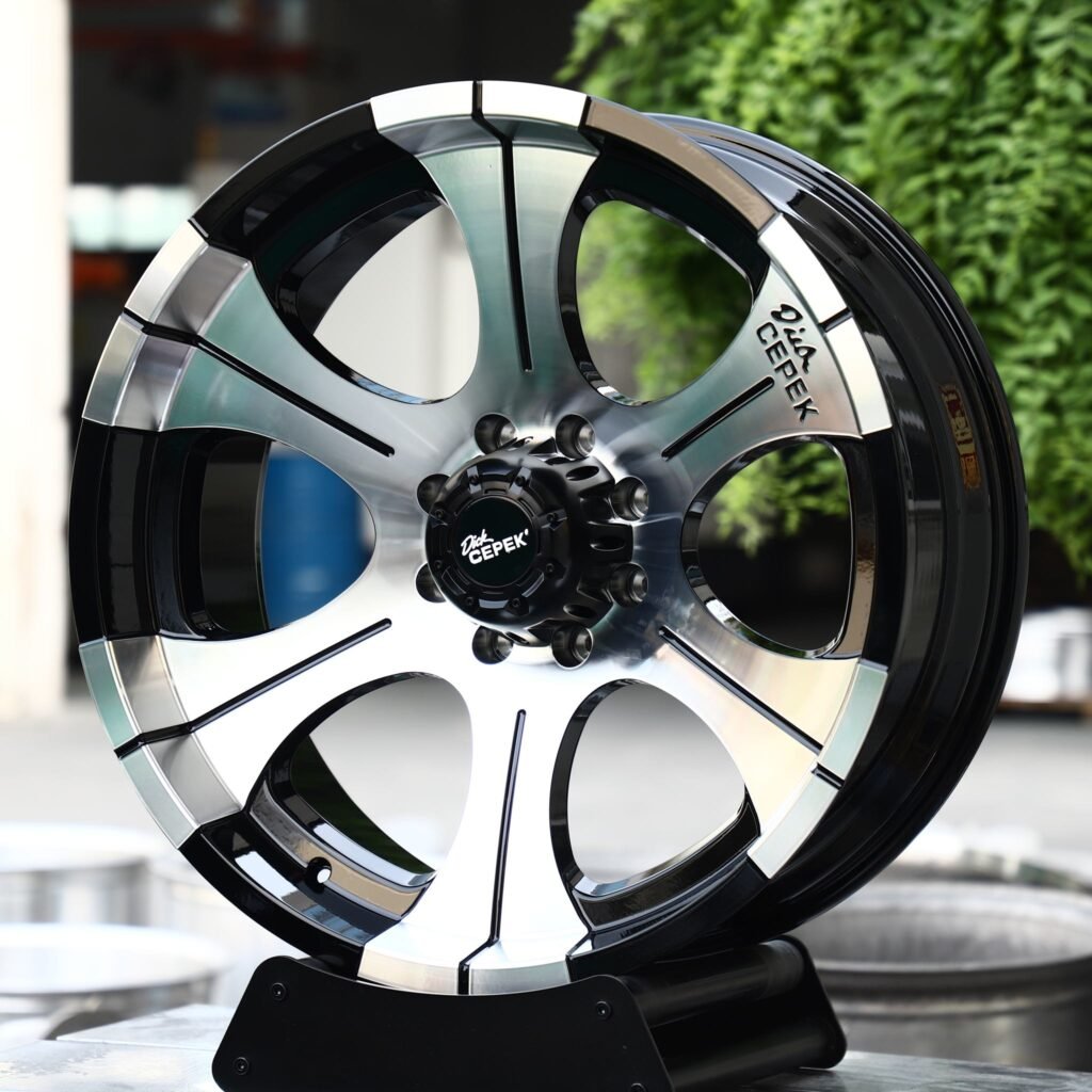 Chevrolet Silverado HD wheels – Black / Machined 6-Spoke (Dick Cepek-Style), angled view
