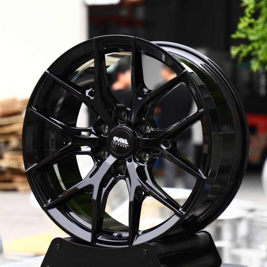 Toyota Tacoma wheels – Gloss Black 6 Split-Spoke (EVAA-Style), angled view