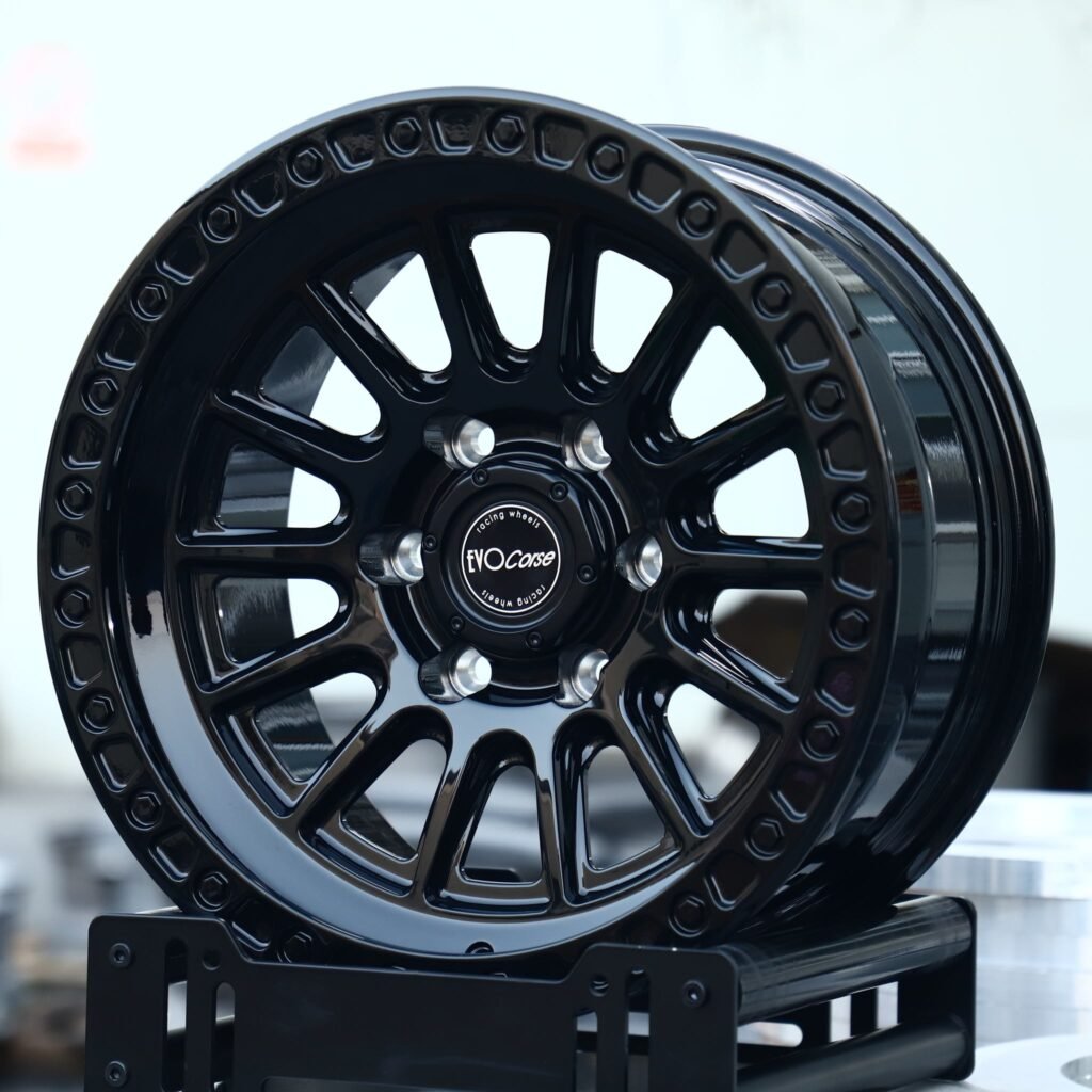 Chevrolet Silverado wheels – Gloss Black 12-Spoke Bolt-Ring (EvoCorse-Style), angled view