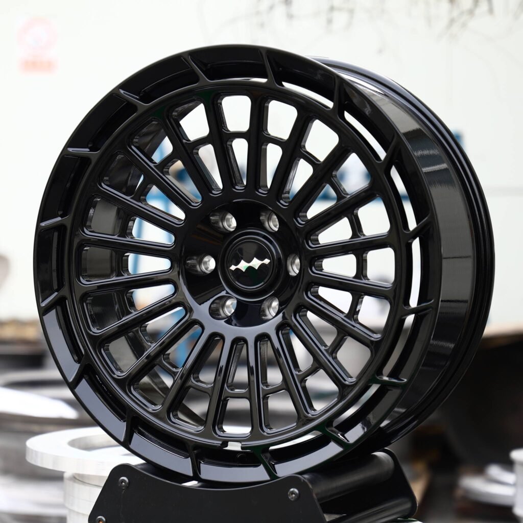 BYD Shark wheels – Gloss Black Multi-Spoke Bolt-Ring (Fang Cheng Bao OEM-Style), angled view