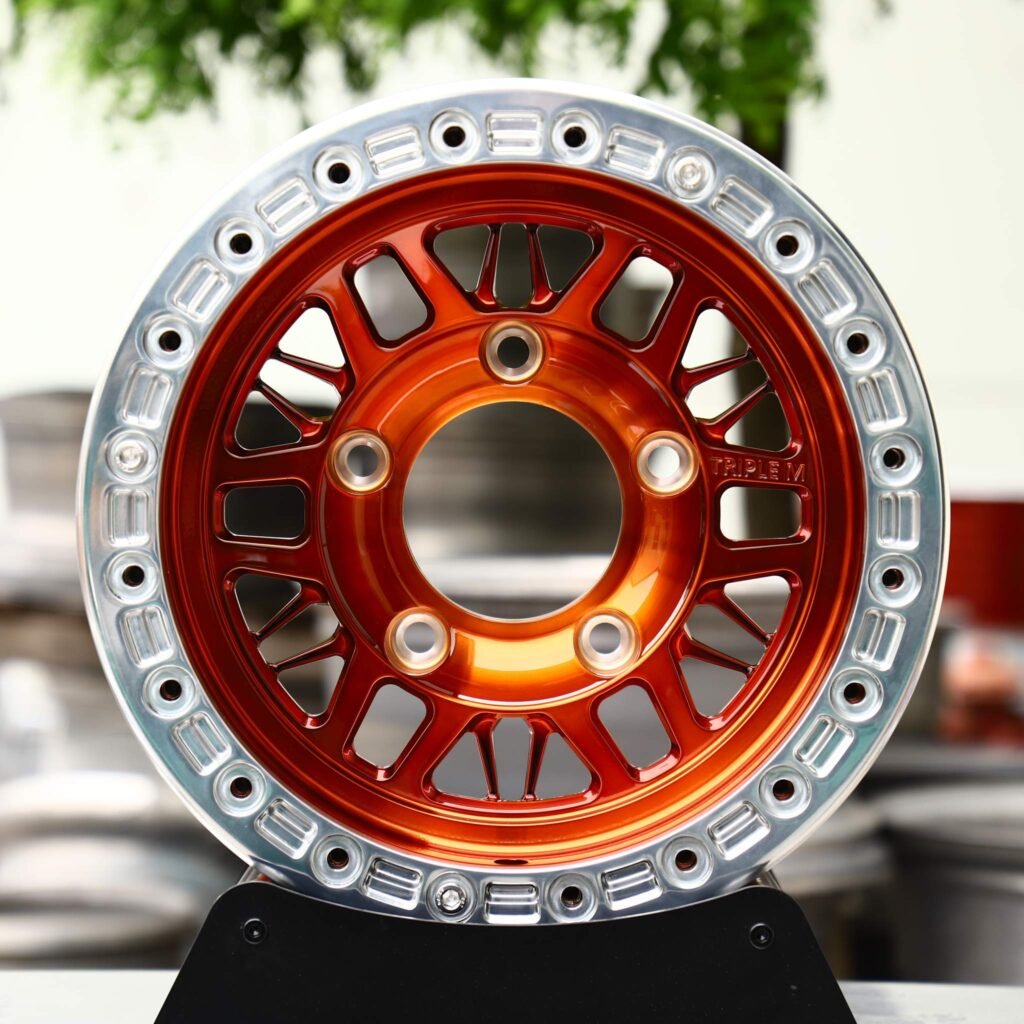 Ford Mustang wheels – Candy Orange Mesh Polished Beadlock, front view