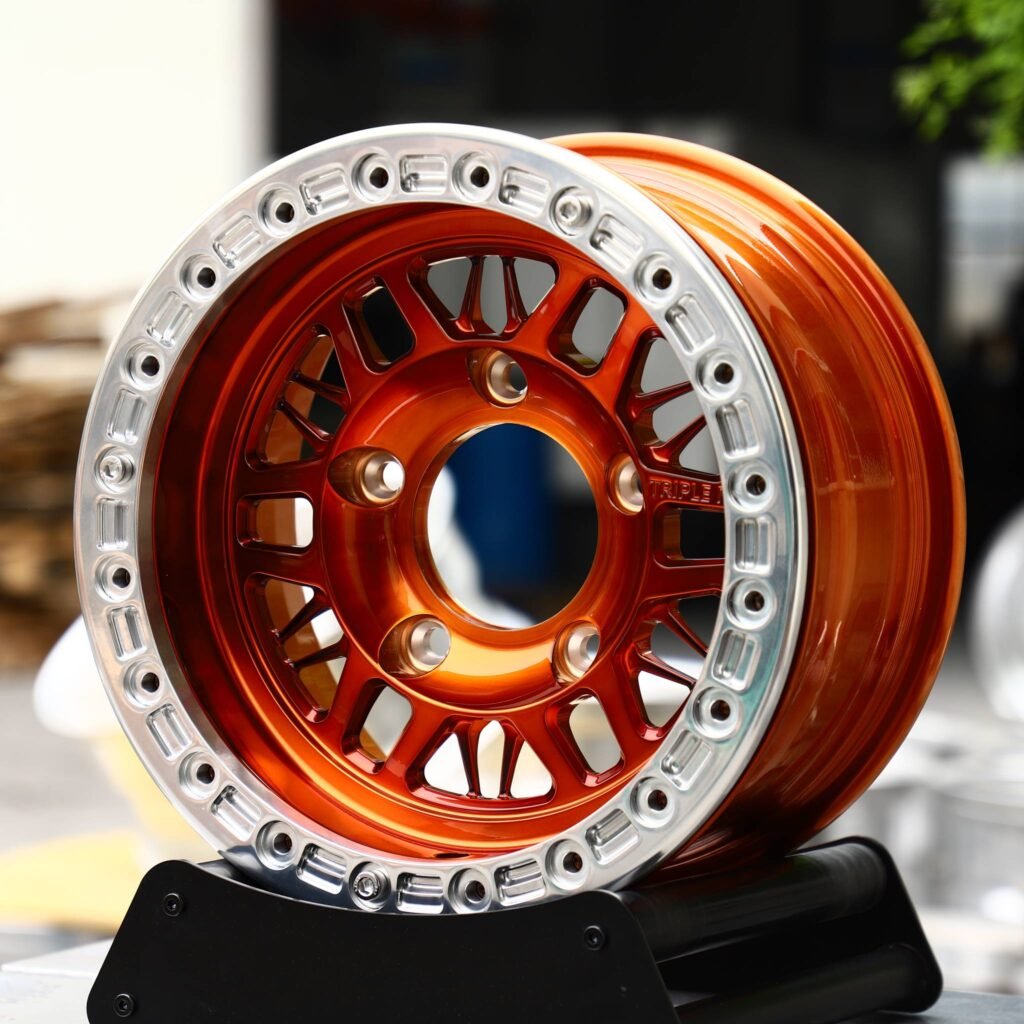 Chevrolet Corvette C7 wheels – Candy Orange Mesh Polished Beadlock, angled view