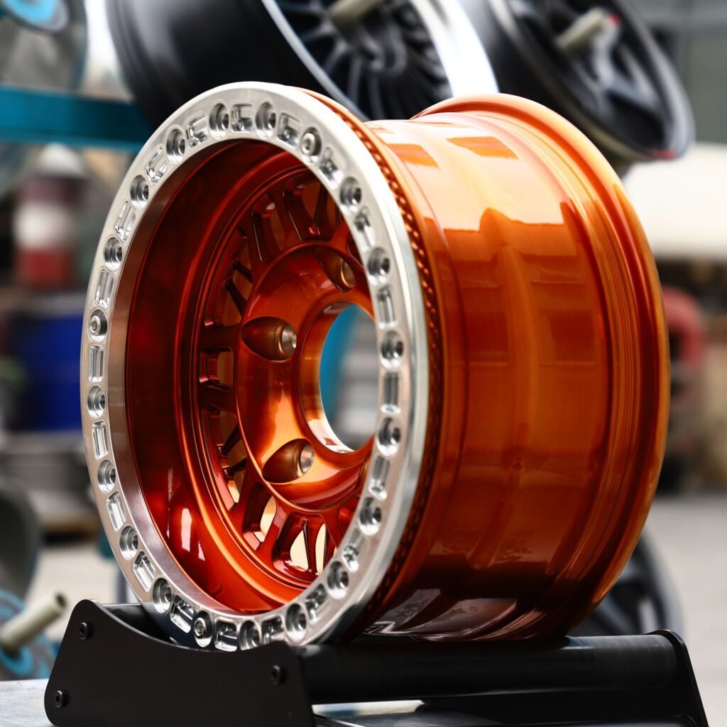 5x114.3 wheels – Candy Orange Mesh Polished Beadlock, side view