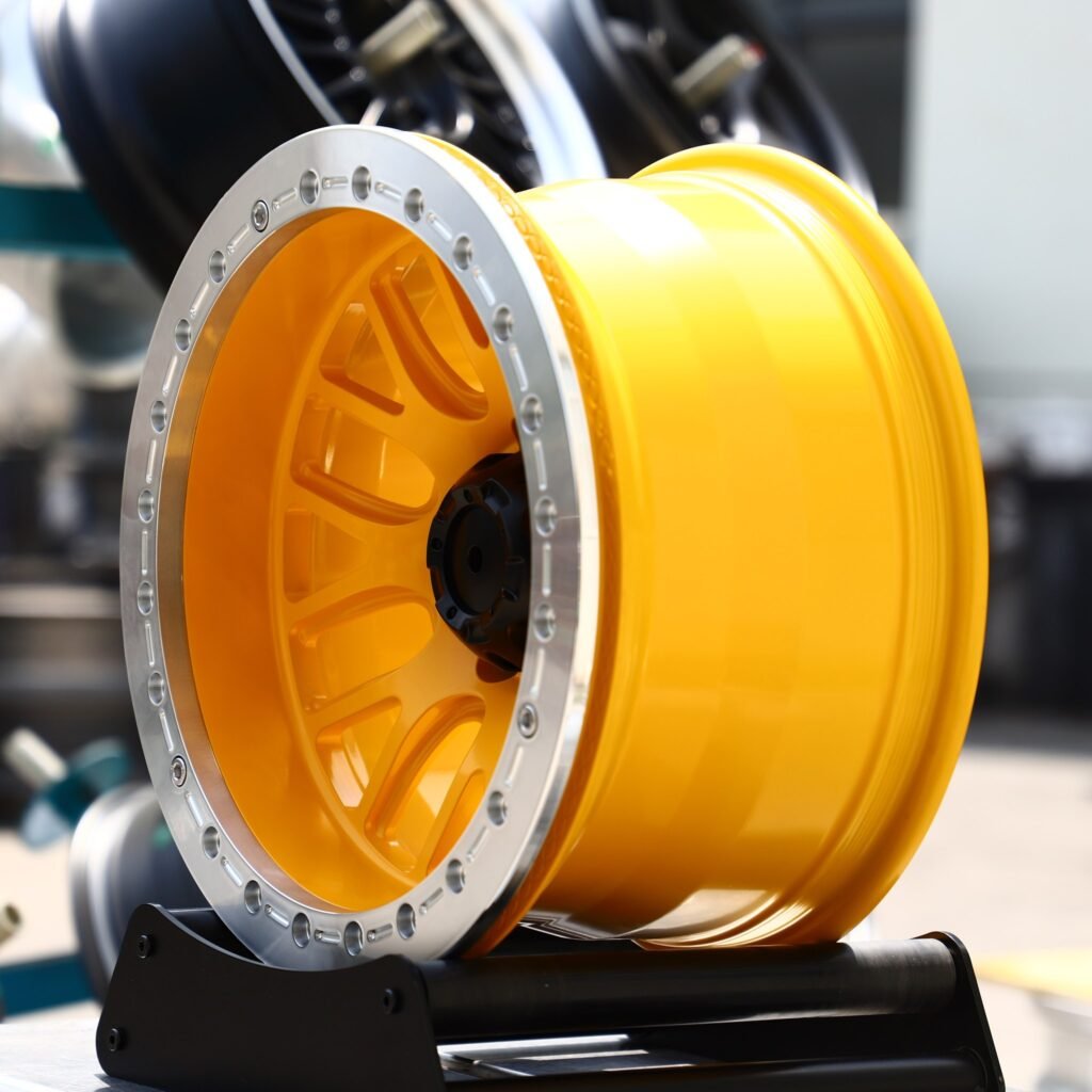 5x114.3 wheels – Yellow 16-Spoke Polished Beadlock, side view