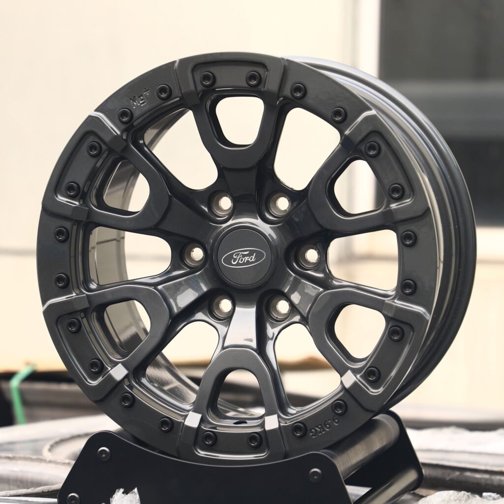 Ford Bronco wheels – Gloss Black / Gunmetal 6-Spoke Beadlock (Ford OEM-Style), angled view