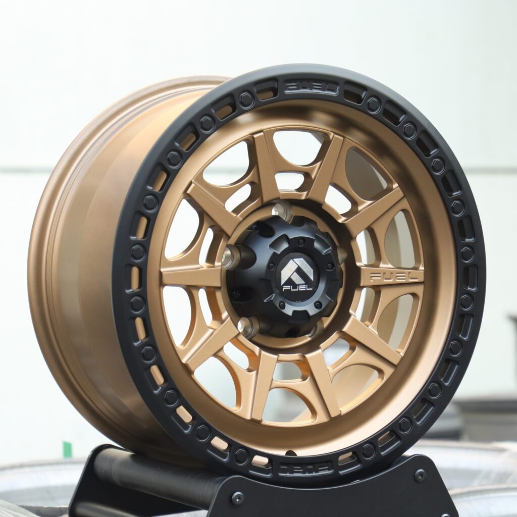 6x139.7 wheels – Fuel Gloss Black / Bronze Exposed Bolt Detail Double Ring Lip, side view