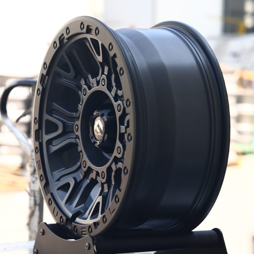 6x139.7 wheels – Fuel Gloss Black / Gunmetal Exposed Bolt Detail, side view