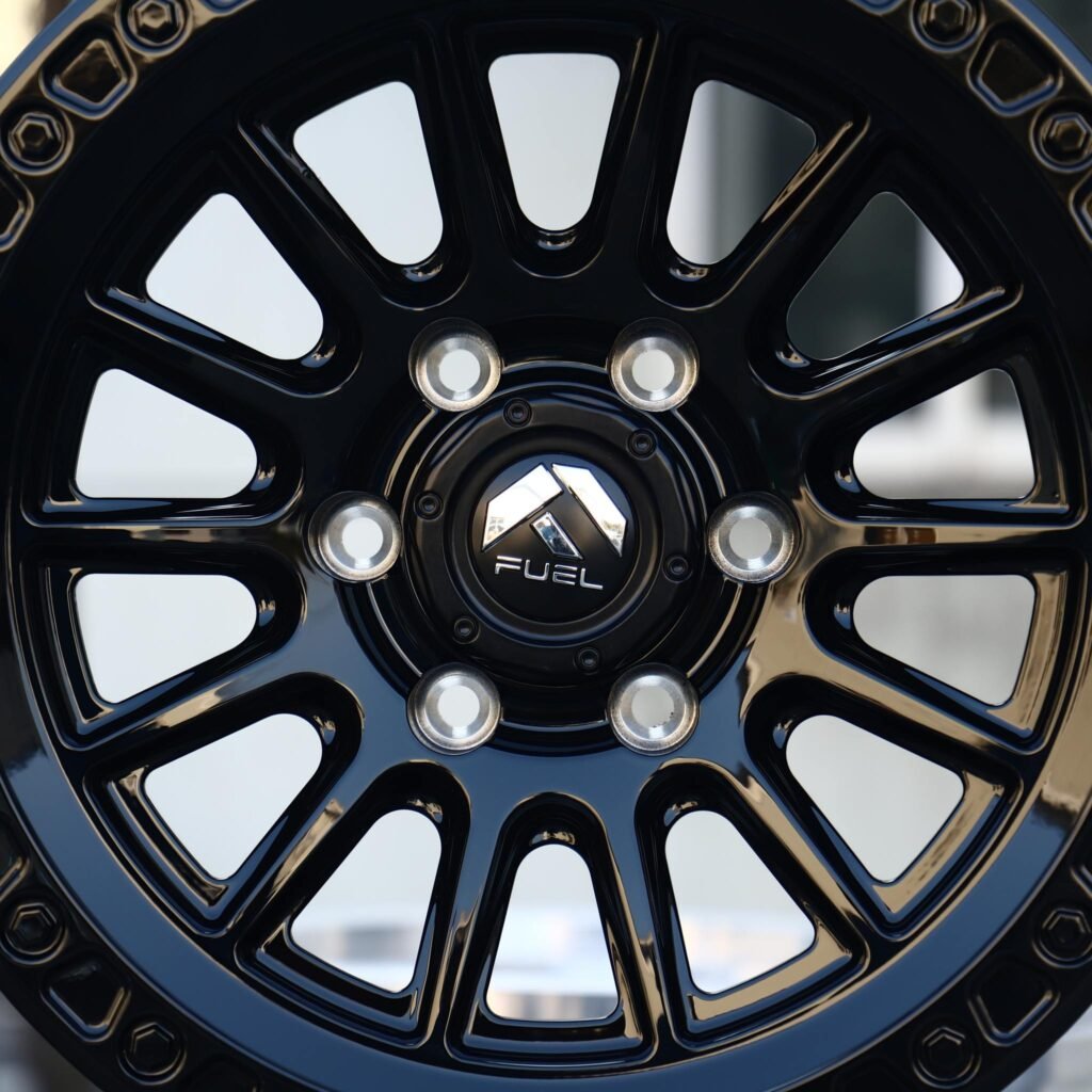 Toyota Tacoma wheels – Gloss Black Multi-Spoke Bolt-Ring (Fuel-Style), lip and barrel detail