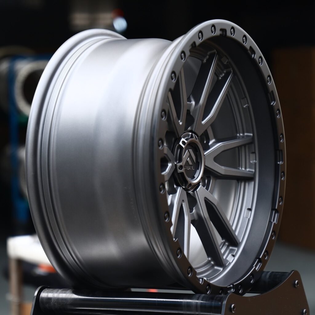 6x135 wheels – Matte Black Multi-Spoke Bolt-Ring (Fuel-Style), side view