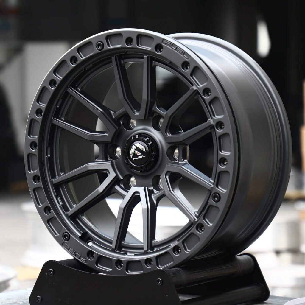 Toyota Tacoma wheels – Matte Gunmetal 10 Y-Spoke Beadlock (Fuel-Style), angled view